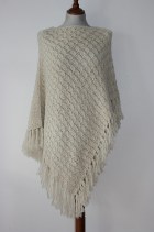 loose knit crochet style sumptious soft cashmere with long tassels, reversible offset poncho...trans seasonal piece
